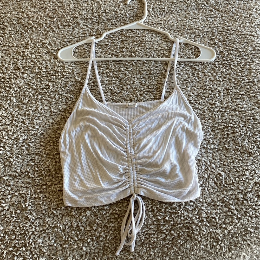 White cropped tank top, adjustable middle to change how long or cropped you want
